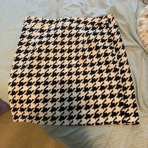 Checkered skirt print.